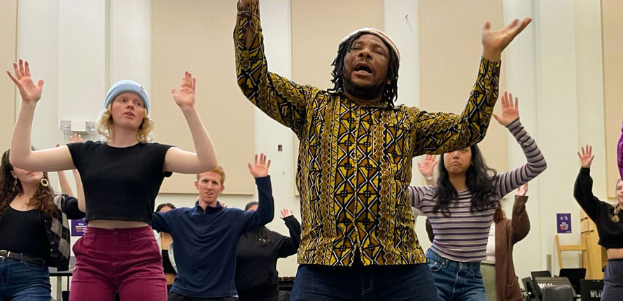 Participants at a drumming event