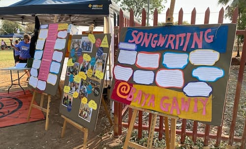 Poster boards full of song lyrics